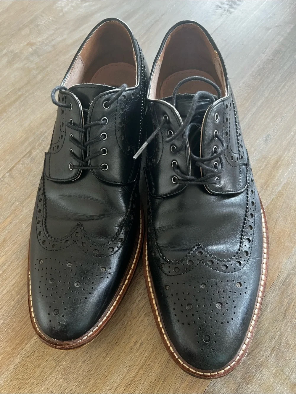 Classic Black Leather Wingtip Oxfords with Contrast Welt